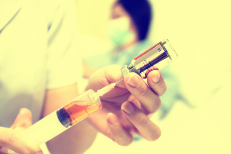 hypodermic syringe in hospital healthy improvement takecareの写真素材