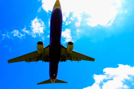 airplane Landing at Phuket International airport in sunny day