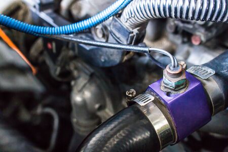 Close up sensor water temp of car in engine room for check temperature of engineの写真素材