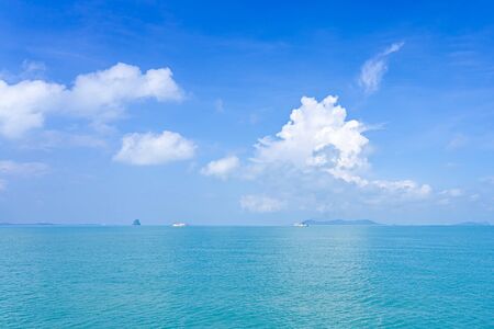 Nature view of the sea clear blue sky with small ship transport car and tourist in holiday の写真素材