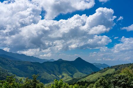 Nature View Wide angle of mountains blue sky and white cloudsの写真素材