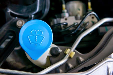 Close up wiper tank in engine room for check water level for Clean the windshield of car basic of...
