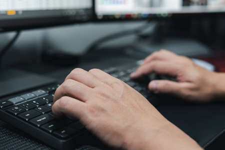 Hand a man push connect button option of computer desktop keyboard for select device for working on...