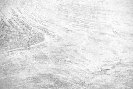 The wood surface looks old, dusty, naturally cracked White color for texture and backgroundの写真素材