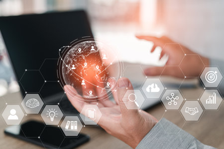 Man Hand holding virtual Global Internet connection, Business global internet connection application and technology with a laptop on the table, Develop of work concept in businessの写真素材