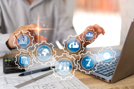 Businessman touching icon screen  transformation technology strategy concept, engineering work concept with various links in the system and working processes to be successful, laptの写真素材