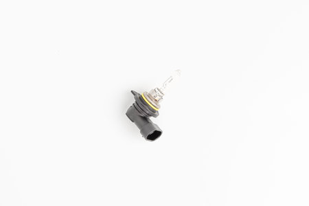 Car headlight bulb halogen type on white background : auto parts conceptの写真素材