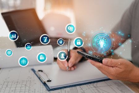 Business idea and industry icon on virtual screen concept,Engineer pressing on calculator for calculating and idea write on note paper engineering Analysis Make a plan for successの写真素材