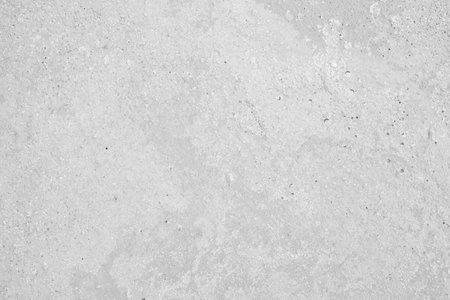 The wood surface looks old, dusty, naturally cracked White color for texture and backgroundの写真素材