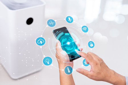 Home smart and technology on virtual screen concept,Man use smartphone control online on application adjust and setting for smart home through the internetの写真素材