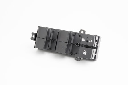 Car window switch spare part in car service part on white background : auto parts conceptの写真素材