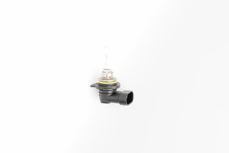 Car headlight bulb halogen type on white background: auto parts conceptの写真素材