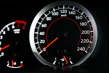 Close up fuel meter gauge shows the fuel level while in use of carの写真素材