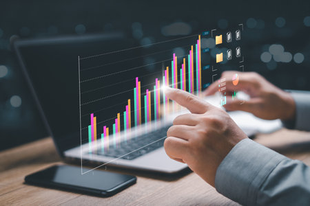 Business strategy concept, automated operations, customer service, data management financial analytics, Businessman analysis market data, and planning by comparing data from graphsの写真素材
