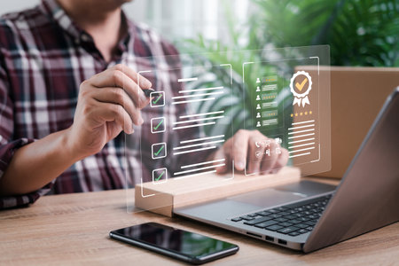 Customer rating to service experience and Warranty for parcel delivery online application ,A man checking on digital checklist warranty terms and customer satisfaction ratings feedback surveyの写真素材