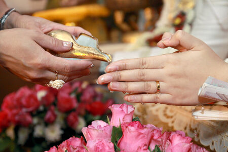 Blessed water at Thai wedding ceremonyの写真素材