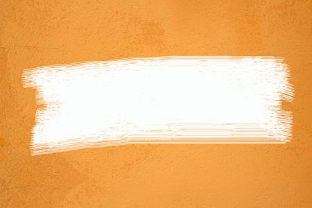 Yellow wall texture for backgroundの写真素材