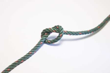 Green nylon rope tied the knot