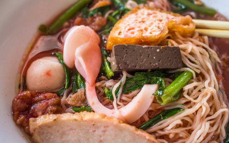 Tofu noodle ,a kind of Thai noodle that come with pickled bean curd soup called  Yen Ta Fo  