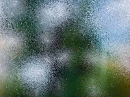 Water drops steam of rain on window glass after the rainの写真素材
