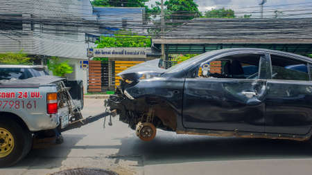 Bangkok, Thailand - August 6, 2019 : Car damaged crash from car accident on the road wait insurance in a city collision in Bangkok Road, accidents are a major problem of traffic in Thailand.のeditorial素材