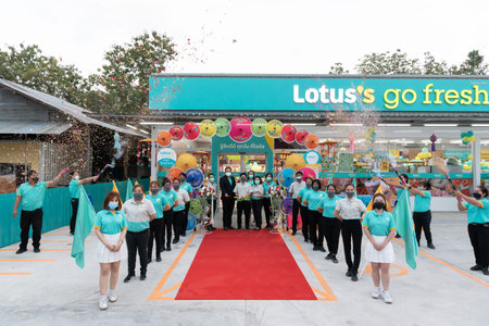Chiang Mai, Thailand - November 23, 2021 : Unidentified retail staff and managers celebrate grand...