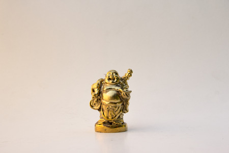 smile buddha statue, god of wealth, happiness and luckyの写真素材
