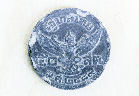 Rama VIII Tin Coins : King Ananda Mahidol Portrait - Garuda, Thai vintage coinの写真素材