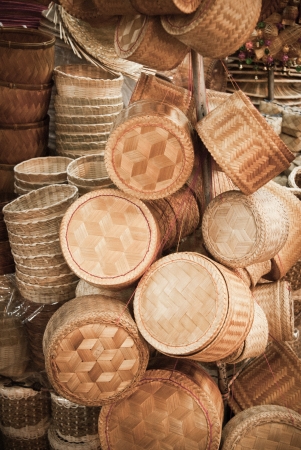 Thai traditional rice box in basketの写真素材