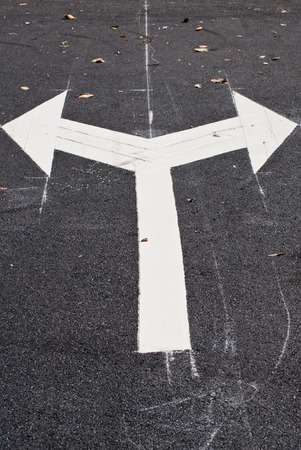 Arrows on the road junctionの写真素材