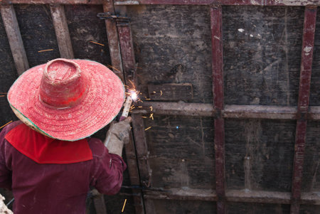 Workers are welding steel