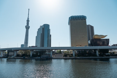 TOKYO, JAPAN - APRIL 9, 2023: Skyline building and Tokyo Skytree tower, famous landmark near Sumida river, view from Asakusa district in Tokyo, Japanのeditorial素材