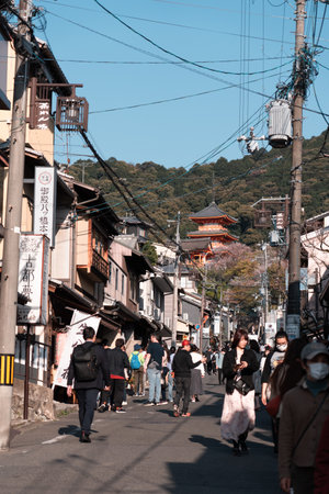 KYOTO, JAPAN - April 3, 2023: Tourist walking to Kiyomizu-dera temple in Highashiyama district areaのeditorial素材