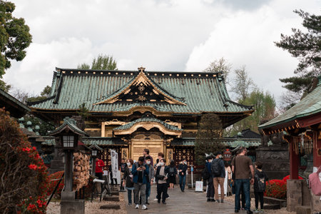 TOKYO, JAPAN - APRIL 8, 2023: Tourist walking around Ueno Toshogu Golden Shrineのeditorial素材
