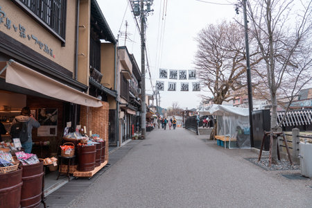 TAKAYAMA, JAPAN - APRIL 5, 2023: Tourist walking and shopping at the Miyagawa morning market in Takayama, Japanのeditorial素材
