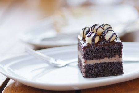 The browny cake on the table with soft lightの写真素材