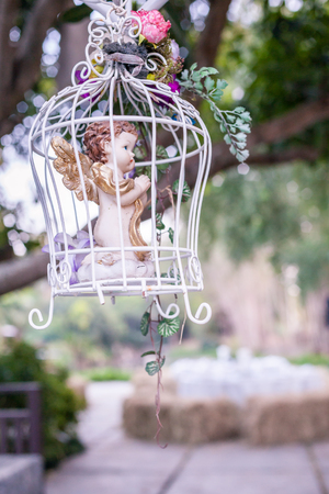 Gorgeous vintage birdcage with flowerの写真素材
