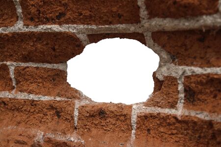 white hole in old wall, brick frameの写真素材