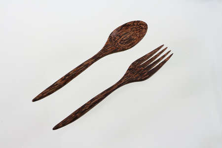 Wooden Spoon and Fork isolated on white Background