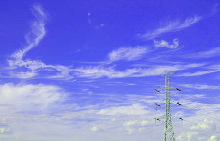 power poles against cloudy sky