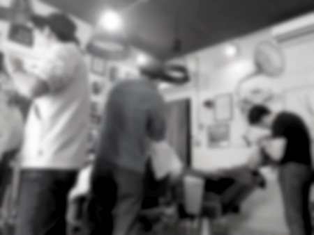 Blurred abstract image of people at haircut shop for background usage.の写真素材