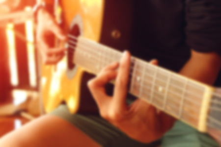 Guitarist for background, soft and blur sunset.の写真素材