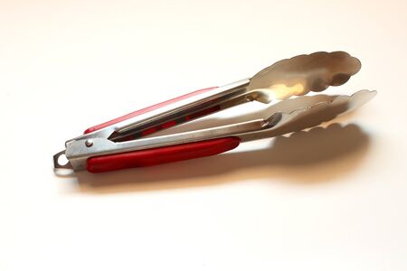 Kitchen Tongs On White Backgroundの写真素材