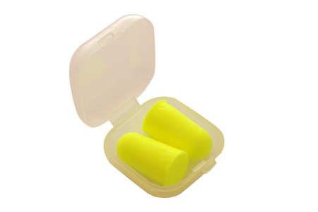 Earplugs to reduce noise in box isolated on white background. clipping pathの写真素材