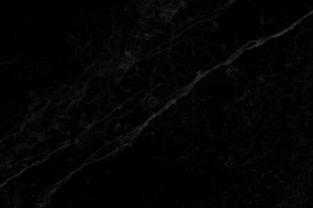 Abstract black marble background with natural motifs.