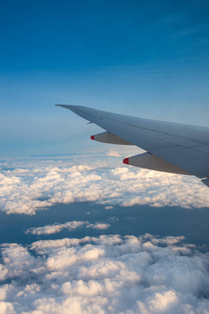 View from the window plane with cloud and fuji mountain.