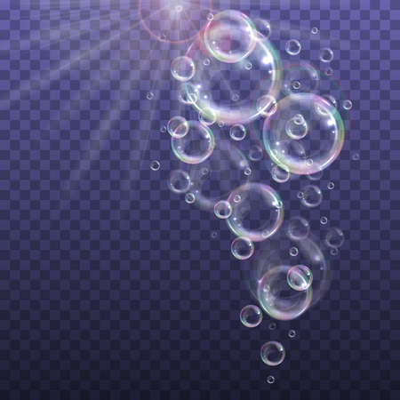 Realistic floating soap bubbles with rainbow reflection on transparent background. Design element for advertising booklet, flyer or posterのイラスト素材