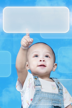 Child raises up forefinger is push buttonの写真素材
