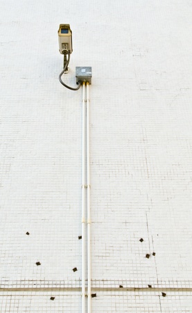 Security camera is install on tile wall