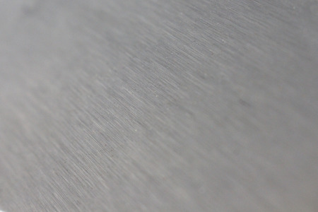 Scratched metal surface for background textureの写真素材